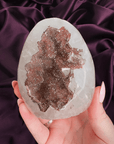 Christmas sugar amethyst egg dome with red green druzy center and polished white quartz body freeform