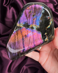 Rainbow flash labradorite freeform with magenta violet and gold shimmer from Madagascar