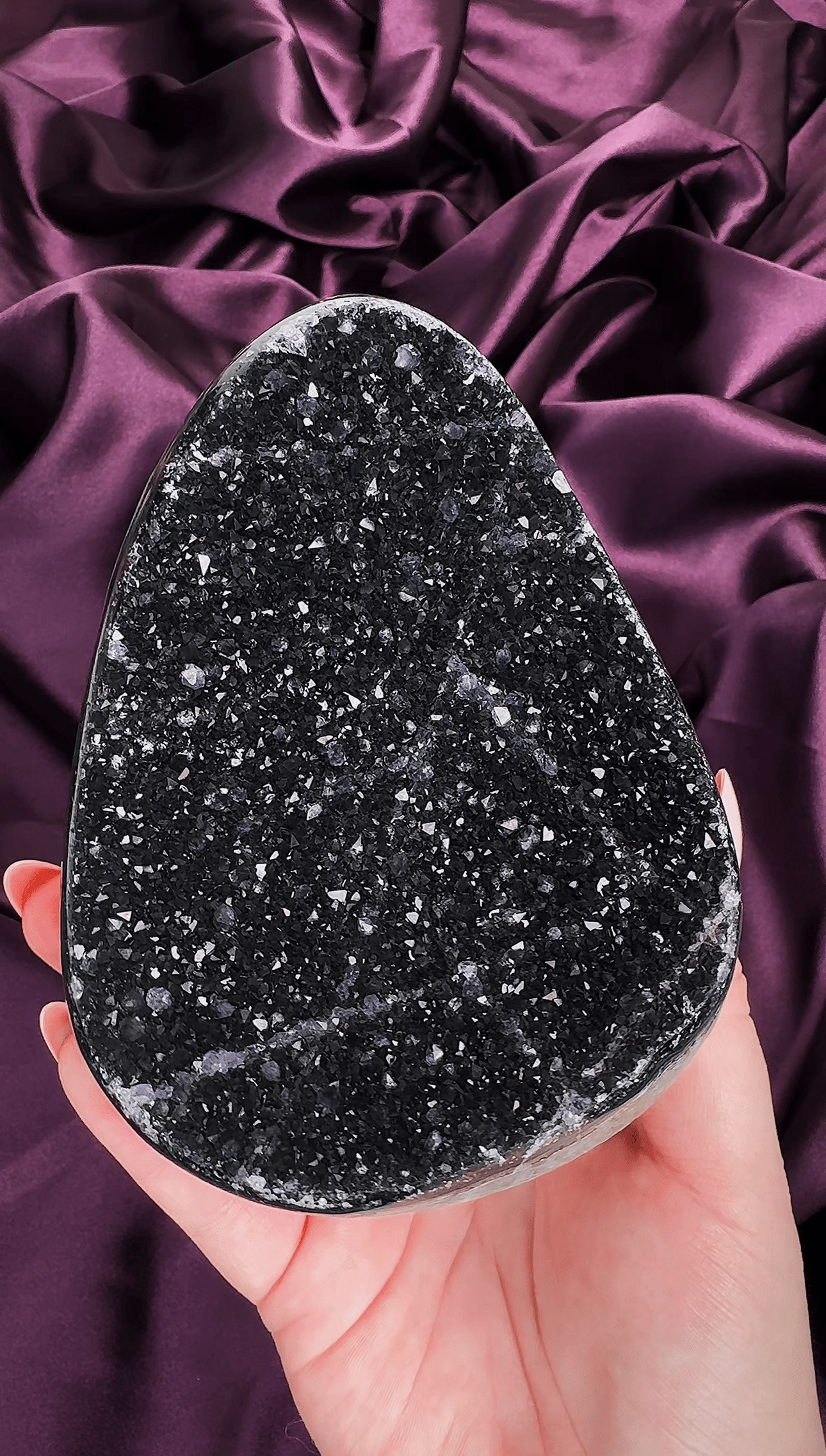 Black galaxy amethyst cutbase with sparkling druzy crystal surface and dark tones