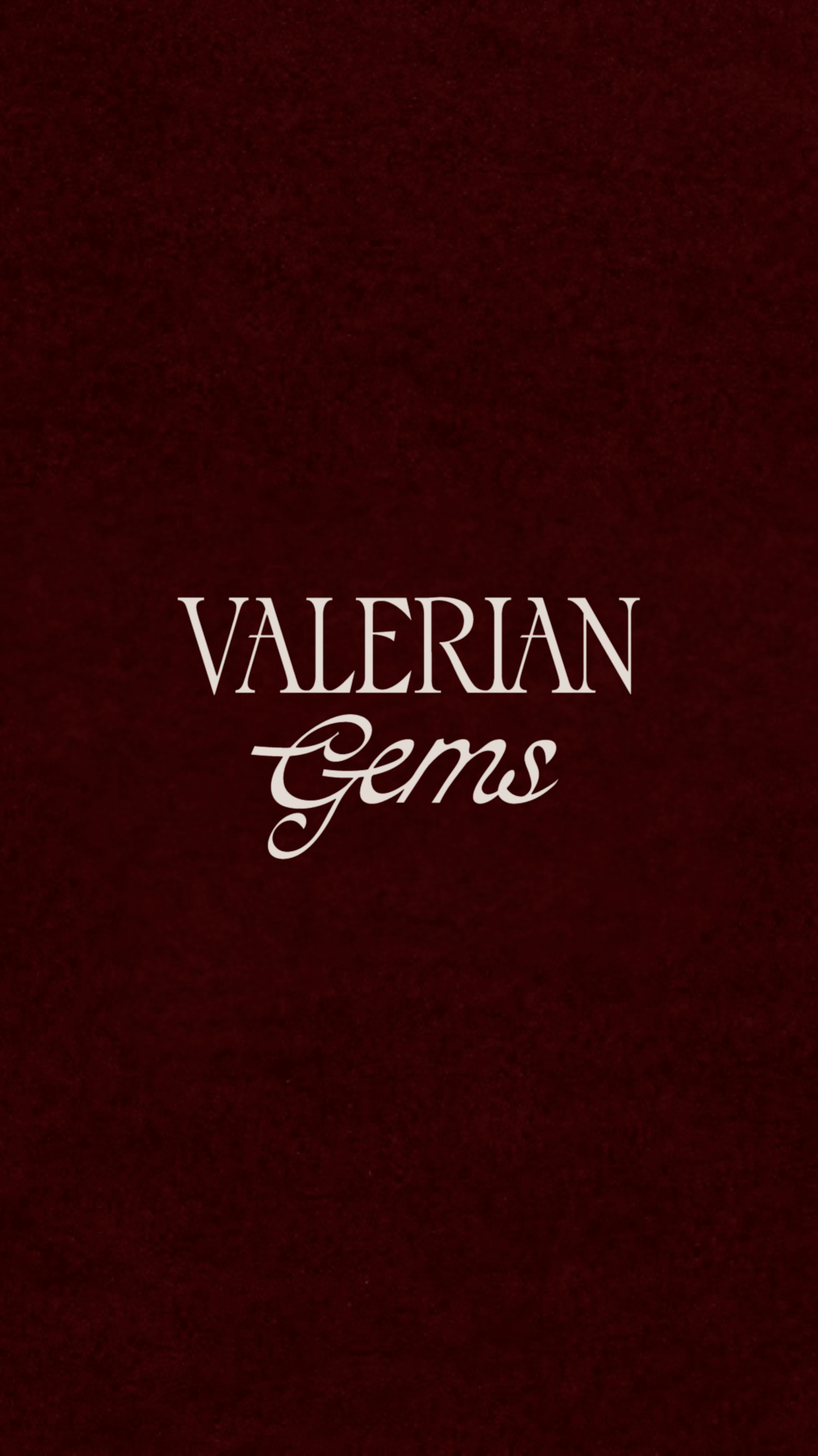 Text 'Valerian Gems' on a dark red background