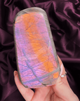 Pastel sunset peach lavender and pink flash labradorite freeform with soft glow from Madagascar