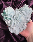 Powder blue sugar fluorite heart with druzy coating and soft icy tones